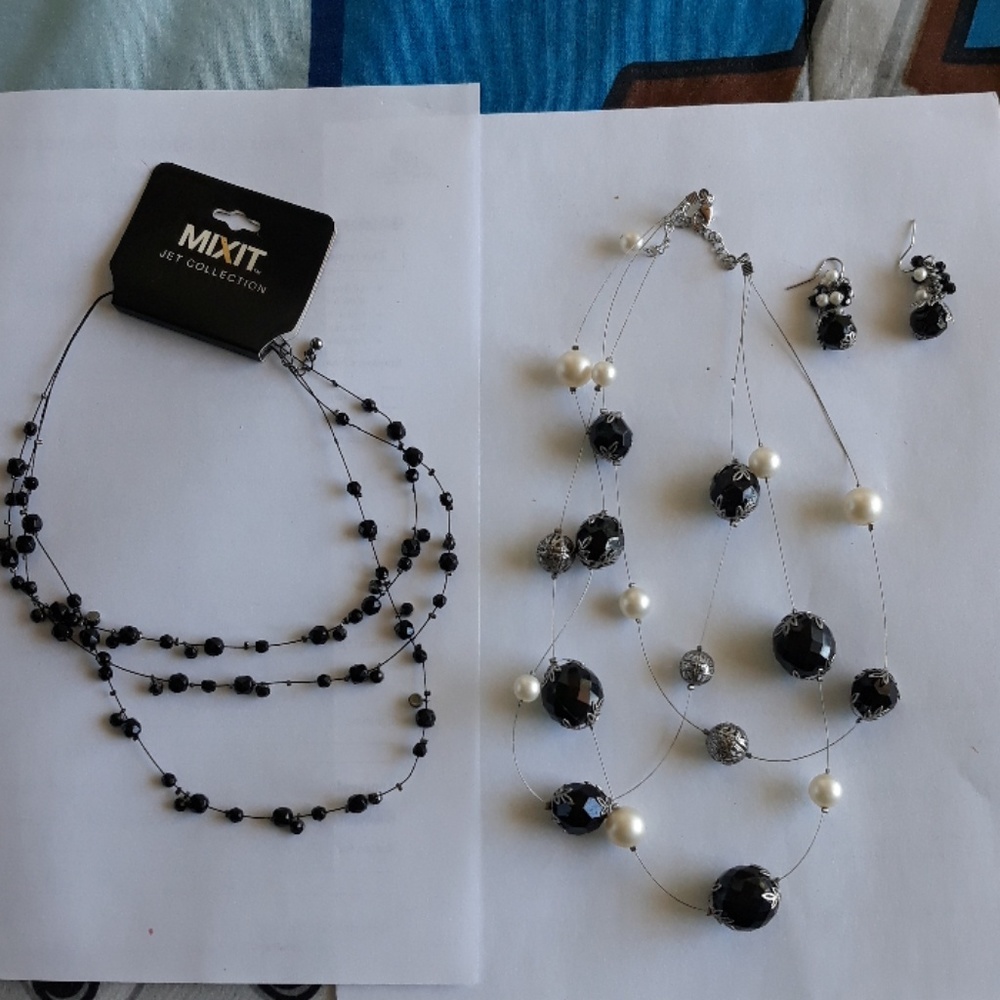 2 necklaces with matching earrings.